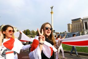 Participants of the action with the national white-red-white flags of Belarus