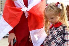 Girl at a rally in support of the people of Belarus