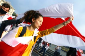 Participants of the action with the national white-red-white flags of Belarus