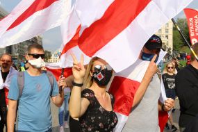 Participants of the action with the national white-red-white flags of Belarus