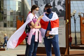 Participants of the action with the national white-red-white flags of Belarus