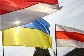 Flag of Ukraine and the national white-red-white flag of Belarus