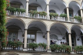 Spectators on the balcony in the Italian courtyard in Lviv