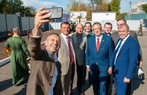 Participants of the event take selfies