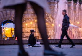 The man asks for alms