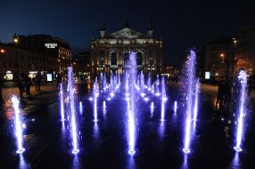 Illuminated fountain near the Lviv National Academic Opera and Ballet Theater