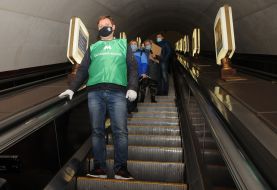 Maxim Derbenev goes down the escalator at the Teremky metro station