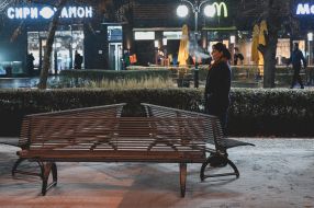 Woman on a snowy alley in Kiev