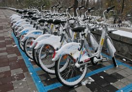 Snow covered bicycles