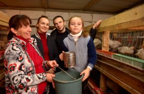 Maxim Galka and his family on a mini-poultry farm