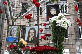 On the anniversary of the tragedy, people brought flowers to Odessa College