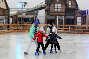 Ice rink in the winter town