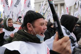 Participants of the action "STOP lockdown!" near the Verkhovna Rada in Kyiv