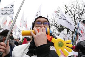 Participants of the action "STOP lockdown!" near the Verkhovna Rada in Kyiv