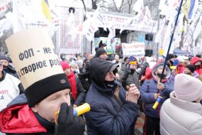Participants of the action "STOP lockdown!" near the Verkhovna Rada in Kyiv