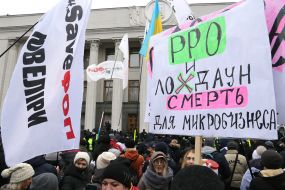 Participants of the action "STOP lockdown!" near the Verkhovna Rada in Kyiv
