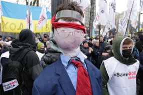 Participants of the action "STOP lockdown!" near the Verkhovna Rada in Kyiv