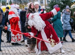 Animator dressed as Santa Clauses