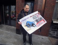 The participant of the action holds a symbolic card