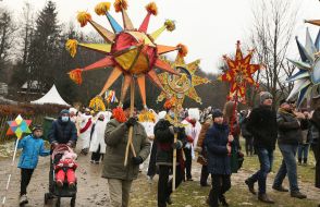 Christmas carolers with a Christmas star