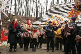 Christmas carolers with a Christmas star