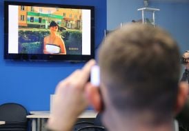 Materials of the press conference on the TV screen