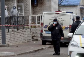 Police near the hospital where the fire broke out
