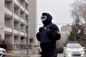 Police near the hospital where the fire broke out