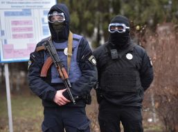 Police near the hospital where the fire broke out