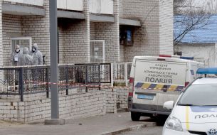 Police near the hospital where the fire broke out