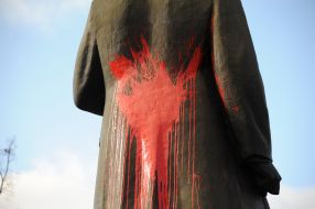 Bandera monument covered with red paint