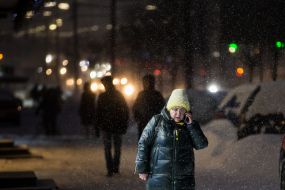 Passers-by on a snowy street