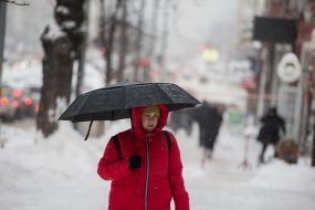 Passers-by on a snowy street
