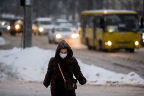 Passers-by on a snowy street