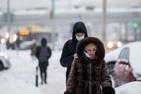Passers-by on a snowy street