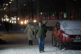 Passers-by on a snowy street