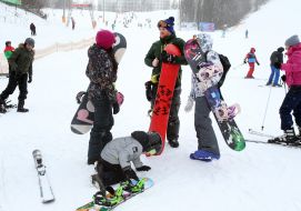 People with snowboards