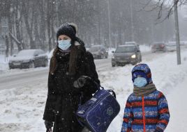 People during snowfall