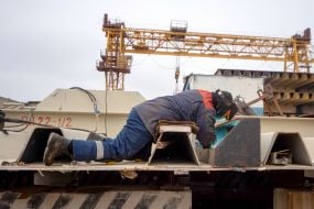 Assembling the third section of the cable-stayed bridge