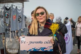 Participant of the march for women's equal rights on Primorsky Boulevard in Odessa