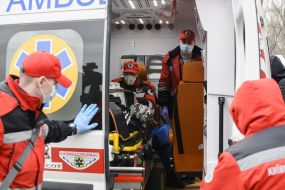 Paramedics provide assistance to the conditional victim