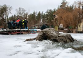 Rescue of a conditionally injured person who fell through the ice