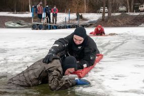Rescue of a conditionally injured person who fell through the ice