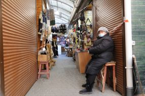 Woman wearing a medical mask at the market