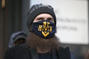 The participant of the action in a medical mask