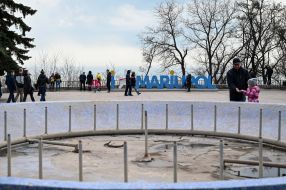 People walk in the park in Mariupol