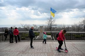 People walk in the park in Mariupol