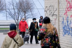 Passers-by in respirator masks