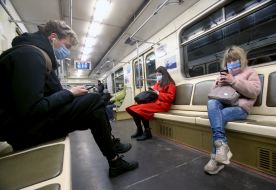 Passengers in a subway car