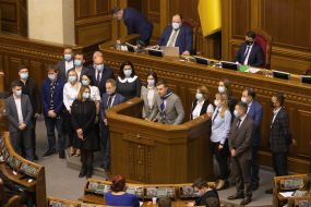 Roman Lozinsky speaks from the rostrum of parliament